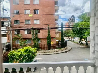 a view from a window of a street with a building at Accommodation HOUSETEL COCOON Medellin in Medellín