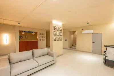 a living room with a couch in a room at Casa Penta Top Notch Villa in Medellín