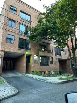 a brick building with balconies on the side of it at Seijakumanila in Medellín