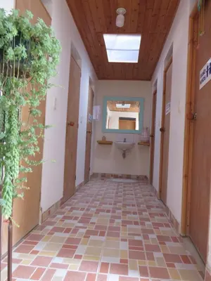 an empty hallway of a hospital with a ceiling at Hotel Casita de Belén in Sonsón