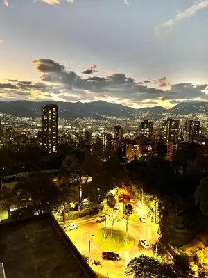 a view of a city at night with cars on a street at 1705 Beautiful apartament, total view of the city in Medellín