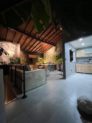 a living room with a couch and a table at POBLADO PARK MANILA in Medellín