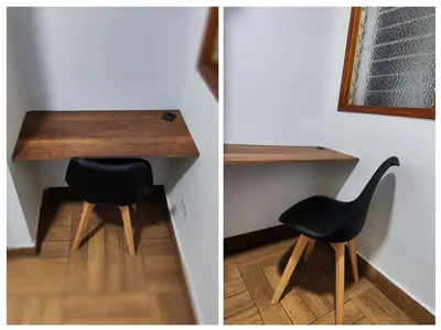 a black chair sitting at a desk in a room at Casa primer piso Laureles, Estadio, UPB, la 70 in Medellín