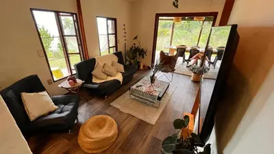 an overhead view of a living room with couches at Casa Nutabe - Casa de Campo en Girardota cerca a Medellín in Girardota