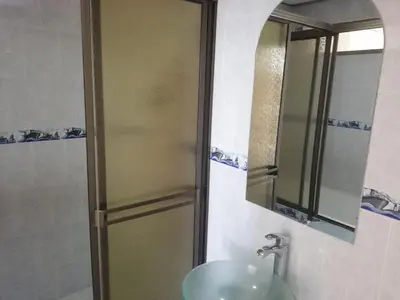 a bathroom with a sink and a mirror at Apartaestudio central con balcón y wifi en Riosucio in Ruiosucio
