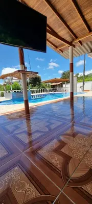 a view of a tile floor and a swimming pool at Cabaña vacacinal in Cocorná