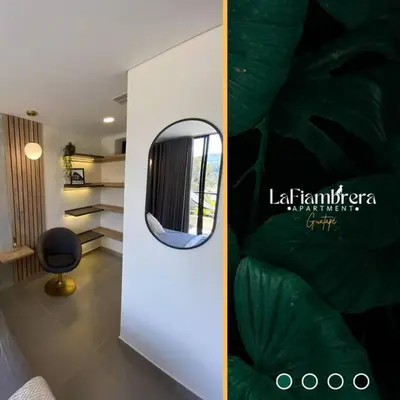 a room with a mirror and a room with a bed at Nuevo apto con acceso al embalse en Guatapé in Guatapé