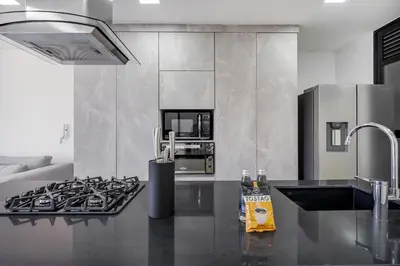 a kitchen with a stove and a stove top oven at Medellin-Cerca al Poblado-201 in Medellín