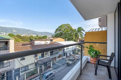 a balcony with a view of a city at MEDELLIN- Cerca al Poblado - 301 in Medellín