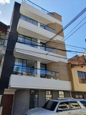 a building with a car parked in front of it at MEDELLIN- Cerca al Poblado-401 in Medellín