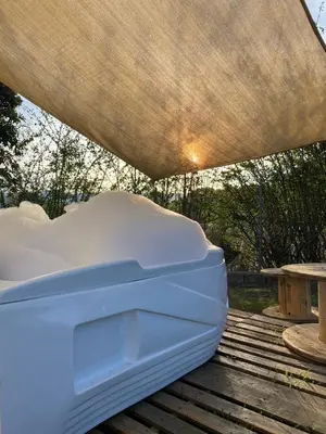 a pile of snow sitting on a wooden deck at Nativo House in Guarne