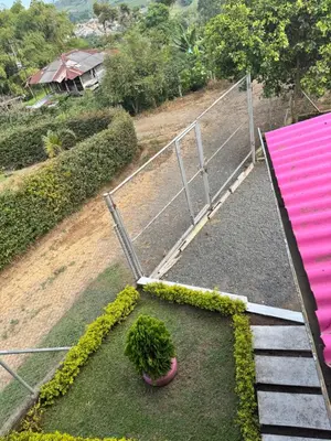 an aerial view of a garden with a fence at La victoria in Marsella