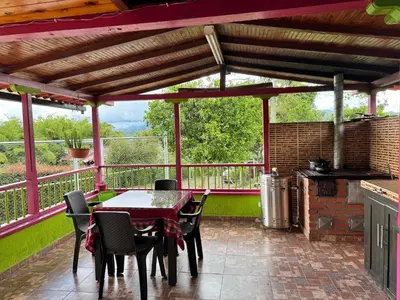 a patio with a table and chairs on a balcony at La victoria in Marsella