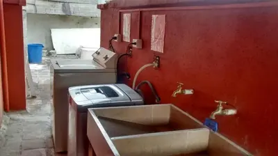 a bathroom with a sink and a toaster at usoinmobiliario in Medellín