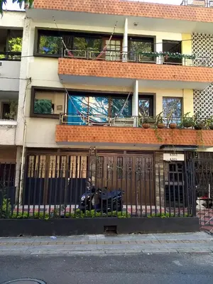 a building with a fence in front of it at usoinmobiliario in Medellín