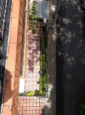 an outside view of a building with plants on it at usoinmobiliario in Medellín