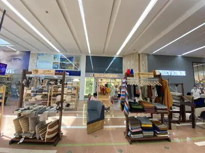 a store with a lot of clothes on display at Moderno y céntrico apartamento con impresionantes vistas a la montaña 202 in Medellín