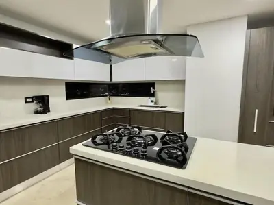 a kitchen with a stove top in a kitchen at 1401, Luxury Penthouse In El Poblado in Medellín