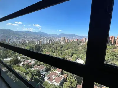 a view of a city from a window at 1202, Central Apartment in El Poblado + View in Medellín
