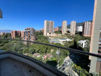 a view of a city from a balcony at 1202, Central Apartment in El Poblado + View in Medellín