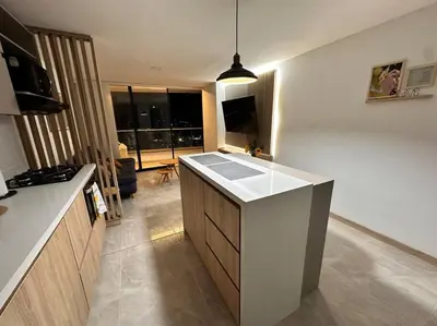 a kitchen with a sink and a counter top at Aluna Apto/ Wellness and Enjoy in Sabaneta