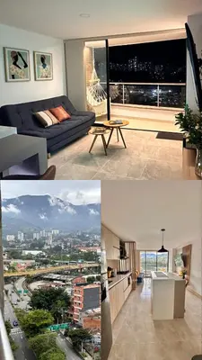 a living room with a view of a city at Aluna Apto/ Wellness and Enjoy in Sabaneta