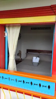 a pretend play house with a bed in it at Apartamento Corona in Confines