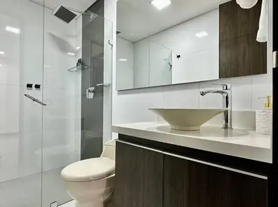 a bathroom with a sink and a toilet and a shower at 302 Spacious apartment nice view in El Poblado in Medellín