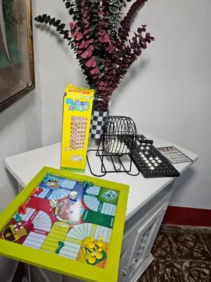 a white desk with a table with a yellow table at Casa De Campo 