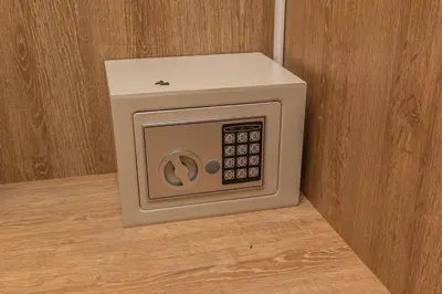 a microwave oven sitting on top of a wooden floor at Bright Studio Topfloor A/C, Poblado Coworking1412 in Medellín