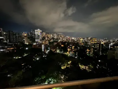 a view of a city at night at Blux 1305 Poblado Medellín Colombia in Medellín