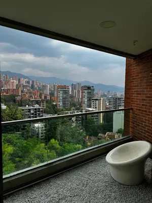 a large window with a view of a city at Blux 1305 Poblado Medellín Colombia in Medellín