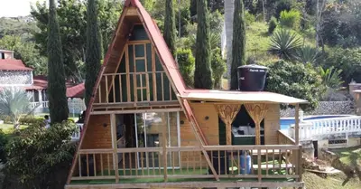 a large play house with a roof at Chalet El Pinal - Copacabana in Copacabana