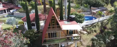 an aerial view of a house with a pool at Chalet El Pinal - Copacabana in Copacabana