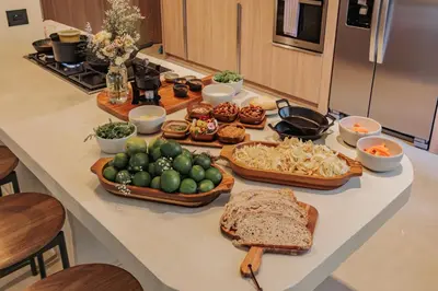 a table with a bunch of food on it at Casa Selva, a unique luxury house in the heart of El Poblado in Medellín