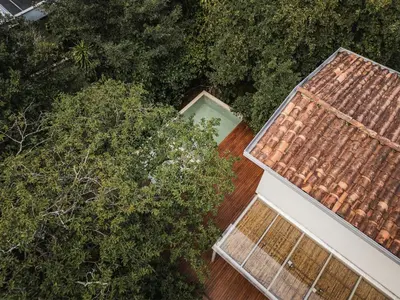 an overhead view of a house with a roof at Casa Selva, a unique luxury house in the heart of El Poblado in Medellín