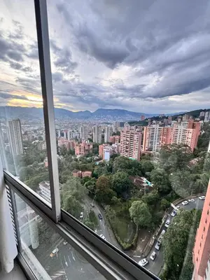 a view of a city from the window of a building at 2211 Despierta en poblado Medellín - Vista panorámica in Medellín