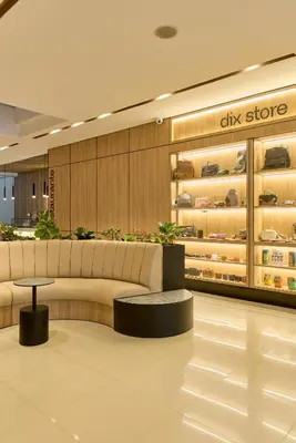 a lobby with a couch and a city store at Hotel Dix in Medellín