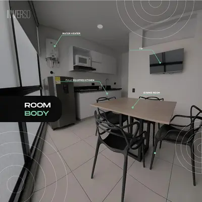 a room with a table and chairs in a kitchen at INVERSO Coliving in Medellín