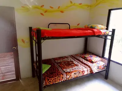 a bedroom with two bunk beds in a room at Hospedaje Pa'Gaïa in San Rafael