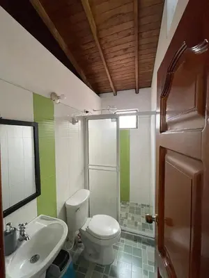 a bathroom with a toilet and a sink at Apartamento 501 in Itagüí