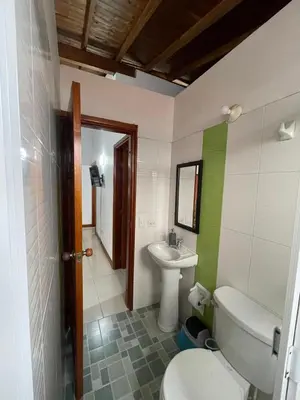 a bathroom with a toilet and a sink at Apartamento 501 in Itagüí