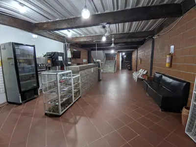 a long hallway with aasteryasteryasteryasteryasteryasteryasteryasteryasteryasteryastery at LA PLAZOLETA in Doradal
