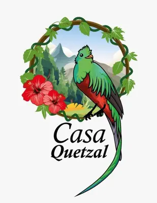 a bird sitting on a branch of a tree with flowers at Apartamento en Jardín Antioquia in Jardin