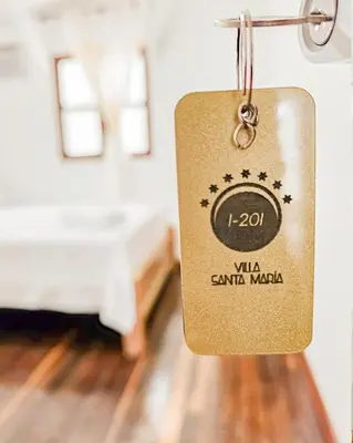 a price tag hanging from a room at Hotel Villa Santa María in Santa Fe de Antioquia