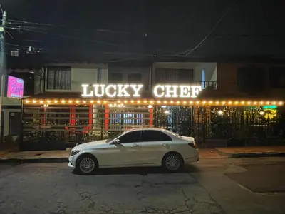 a white car parked in front of a music club at Hotel San Pablo boutique H9 in Medellín