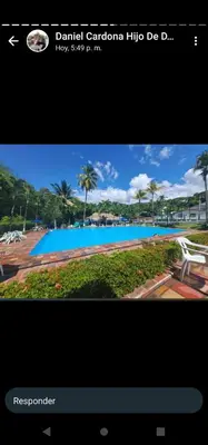 a screenshot of a picture of a swimming pool at Cabaña 2 Montenegro La Pintada in La Pintada