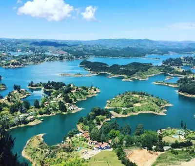 an aerial view of a large river with islands at Serenity house Guatapé in Guatapé