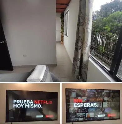a room with a television and a window with a tv at Apartamento en Itagüí in Itagüí