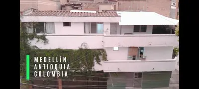an image of a white building with the words melin anthropology colombia at Acogedor Loft con Balcones para 2H Belén Rosales apt 201 in Medellín